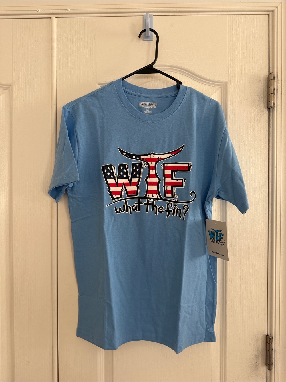 What The Fin? Short Sleeve Tee - Light Blue with American Flag pattern